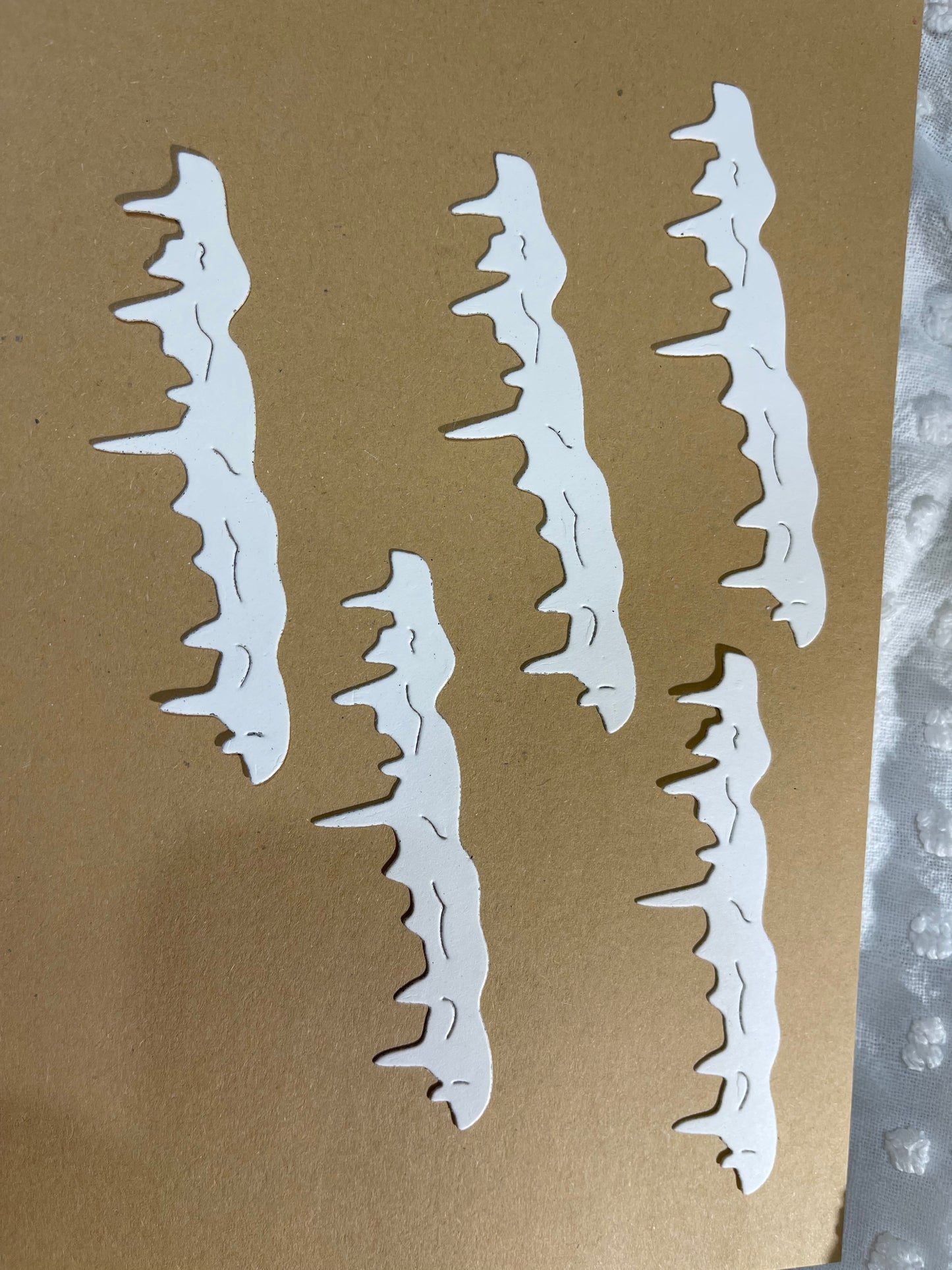 Ice/snow die cuts