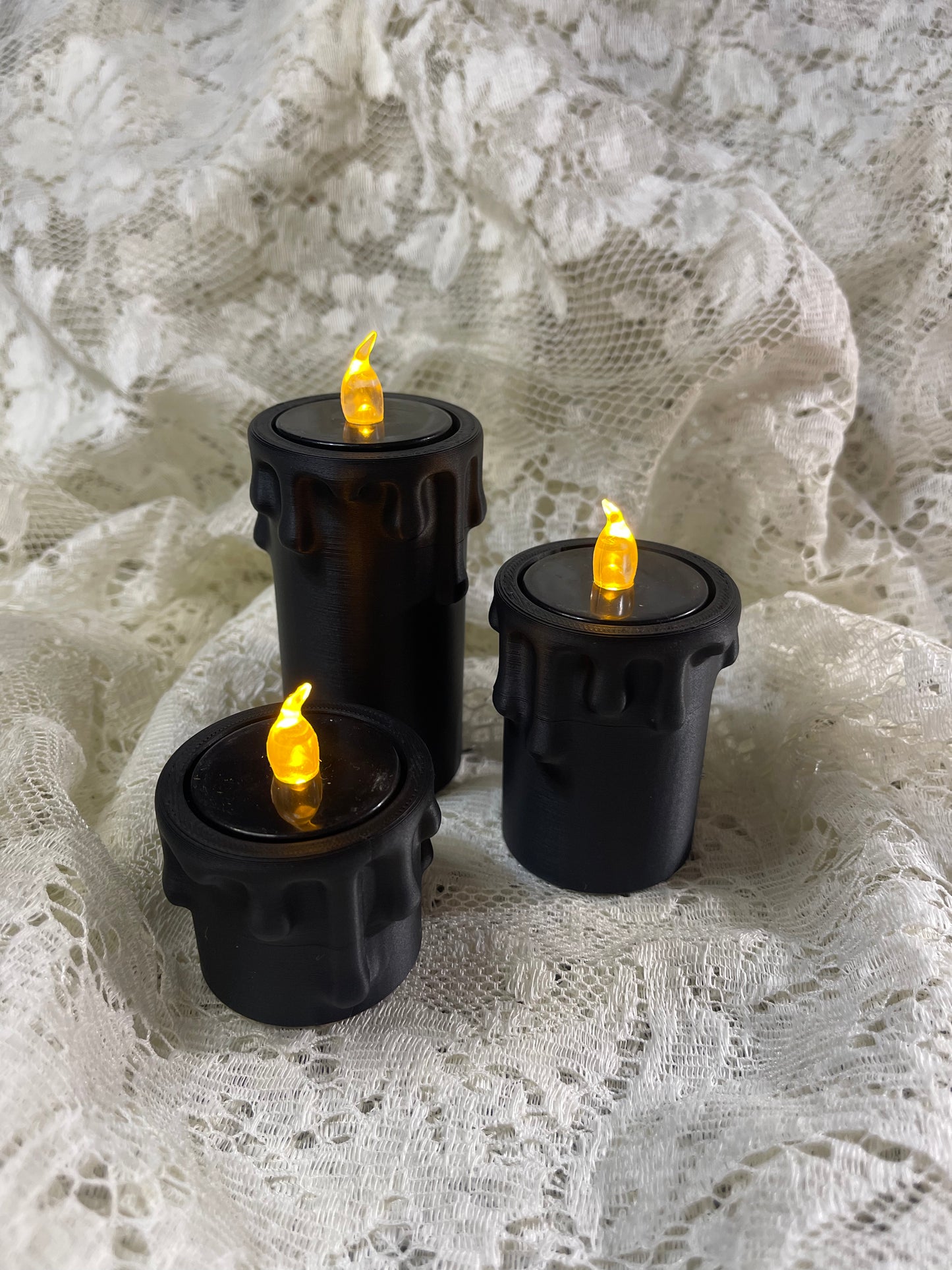 3d printed black candles with tea lights