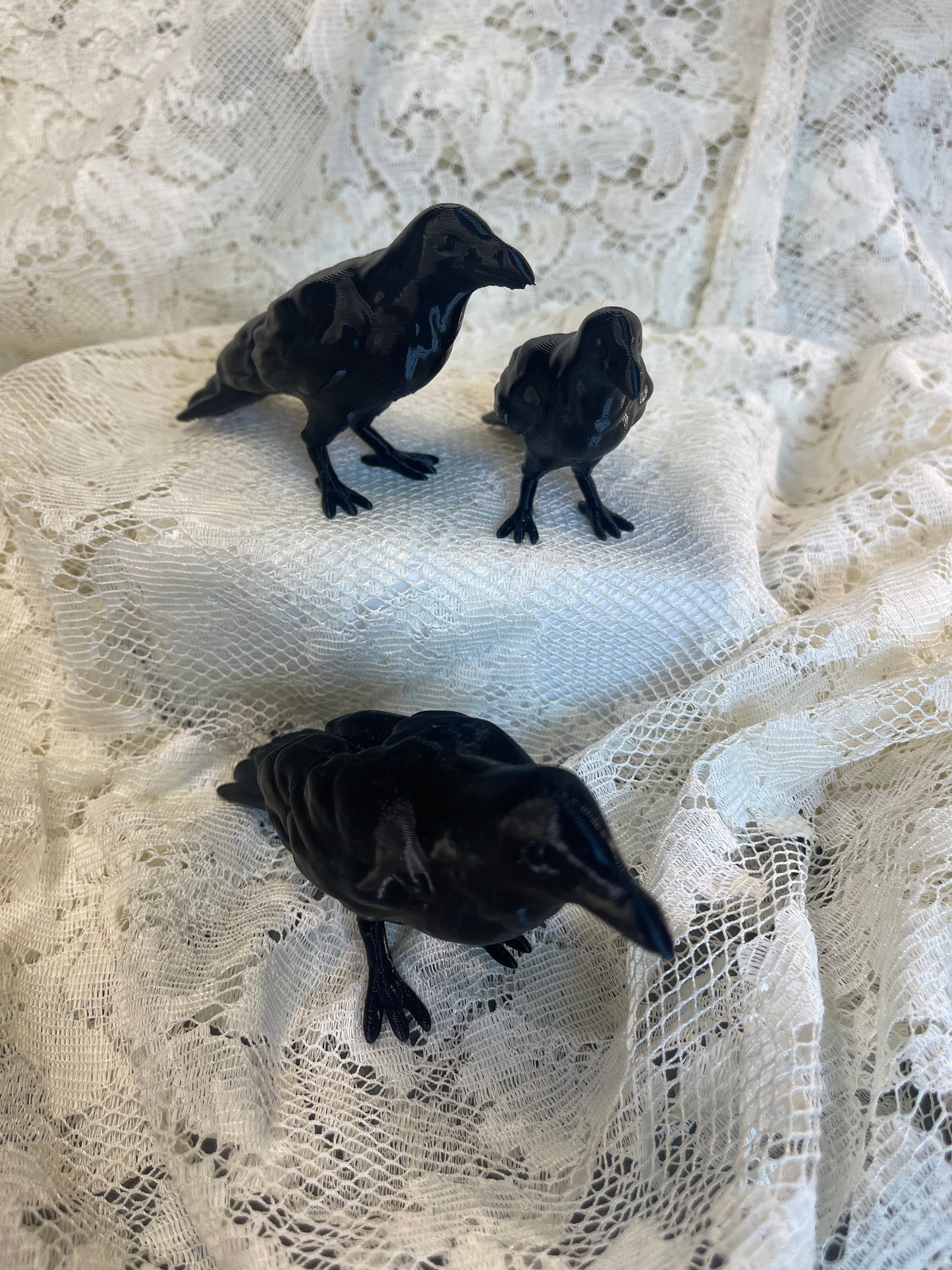 Set of 3-D printed black crows